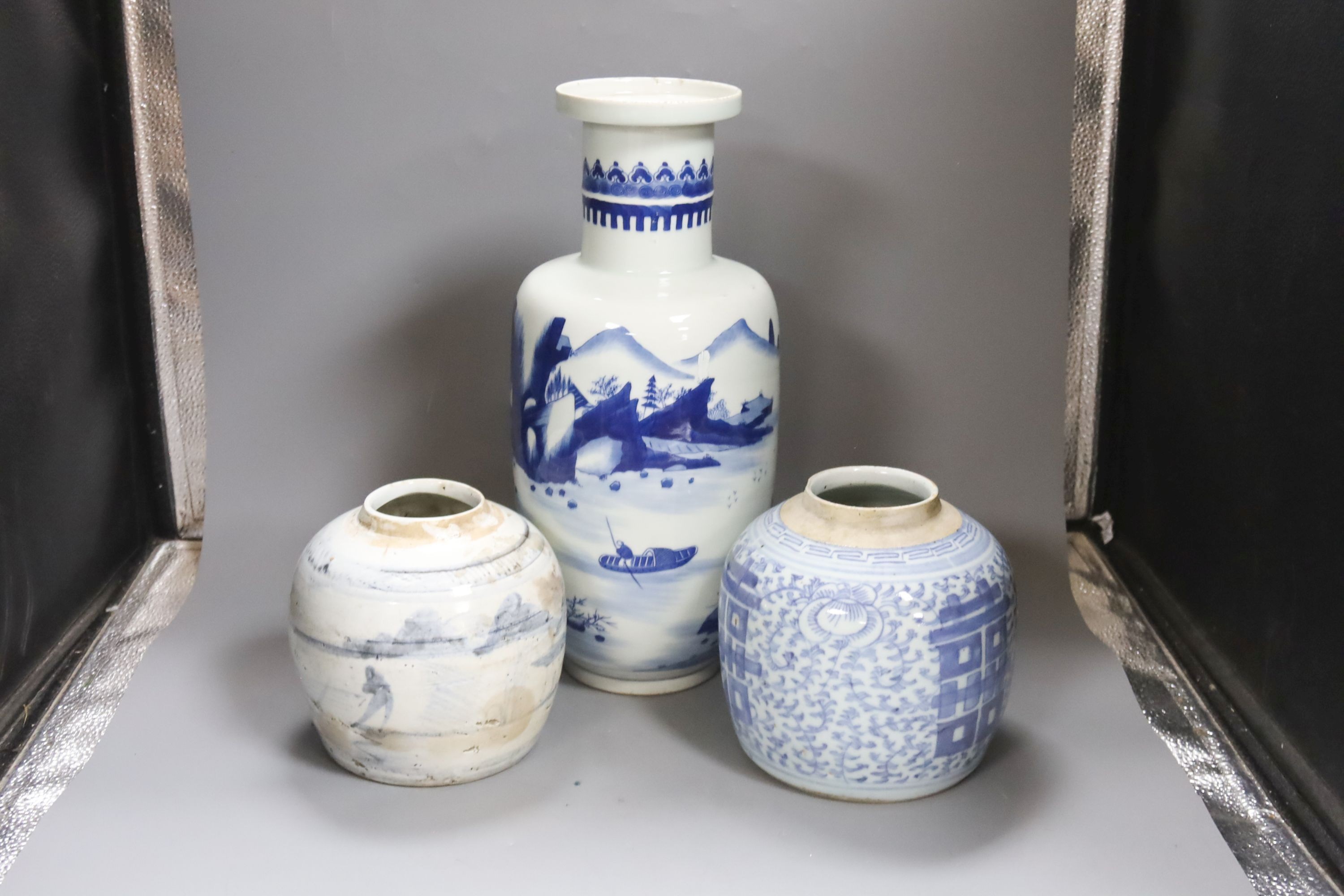A Chinese blue and white rouleau vase and two jars, 19th century and later, 38cm